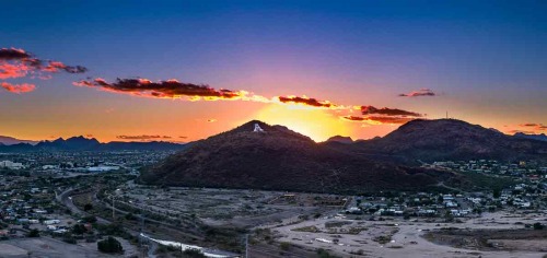 SUNSET SNOW MOUNTAIN by Dean Kelly